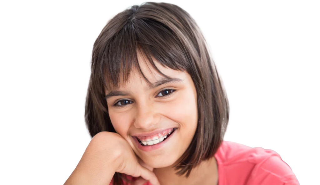 Child receiving early orthodontic treatment in Chesapeake, VA smiling with a metal retainer